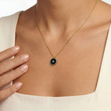 Onyx and Diamond Amulet Pendant, 18K Gold on model