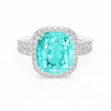 Cushion Paraiba tourmaline and diamond claw set platinum ring
