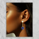 model wearing Lapis Lazuli and Diamond Amulet Drop Earrings, 18K yellow Gold