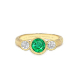 Round Emerald & Diamonds Bezel Set Trilogy, 18K Raw Gold Ring