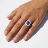 Unheated Cushion Sapphire, Diamonds & White Resin Halo Platinum Ring on hand
