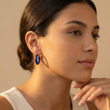 Lapis lazuli hoop chucky earrings in gold on model