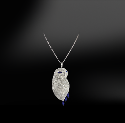 Bubo snowy owl diamonds sapphire gold platinum necklace